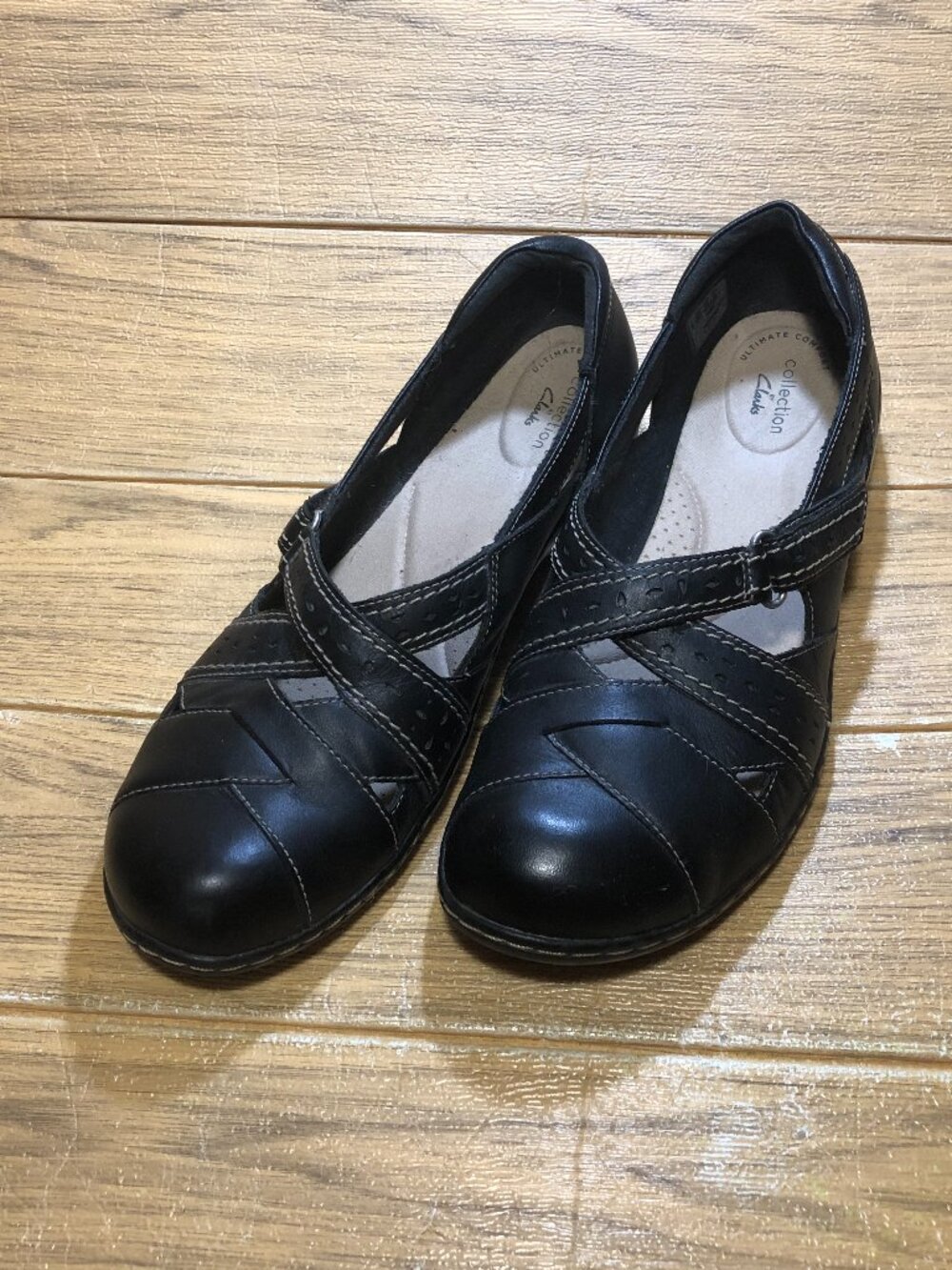 Clarks women black leather slip on loafers, size 12